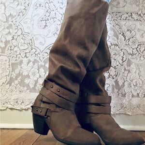 brown Shi by Journeys knee-high heeled buckled boots.